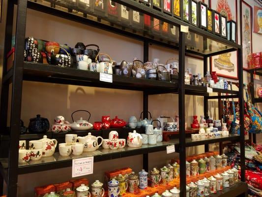 Beautiful tea cups with strainers and sake containers