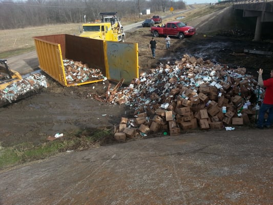 Clean up of cargo of 18 wheeler wreck