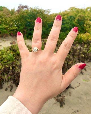 Old European cut diamond in 18k bezel setting engagement ring.