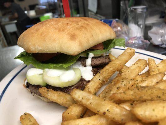 Greek Gyro burger our on a gyro with our house made taziki sauce!