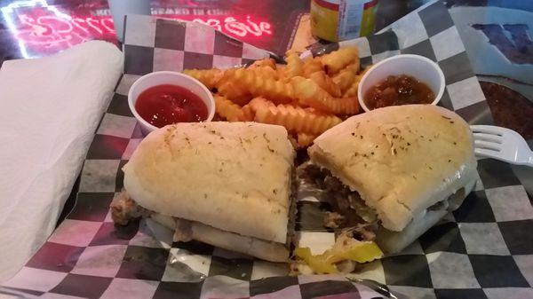 Cheese steak sandwich was tasty.