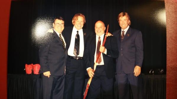 Grand Master Chuck Norris presenting me with a  hand made Gordon Morey long bow.