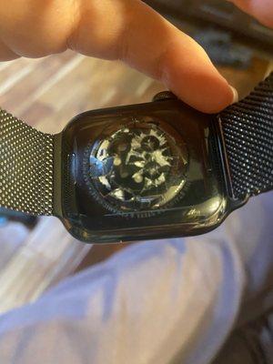 Shattered back of Apple Series 7 watch