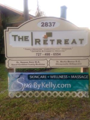 Spa is located at The Retreat. Look for this sign and the green house. Plenty of parking too.