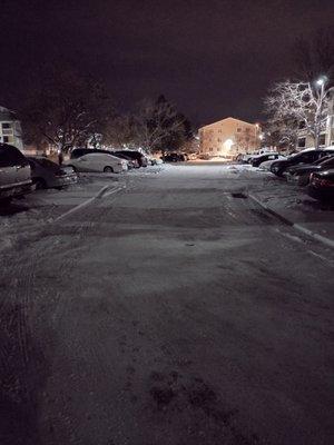 Icy parking lot due to not being plowed