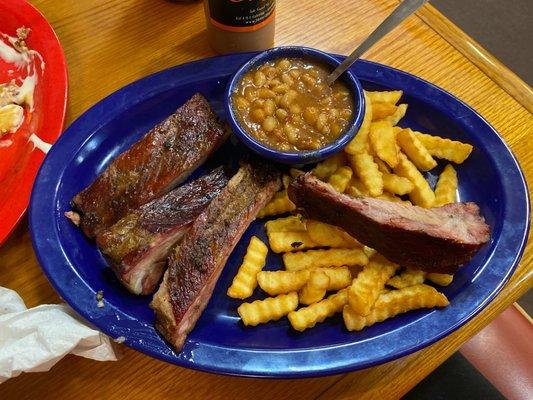 Rib dinner with fries and bbq beans