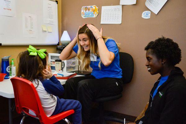 A Hopebridge RBT and BCBA working with a kiddo for ABA therapy.