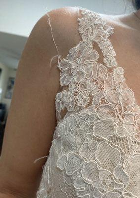 Damaged my dress. Lace ripped off fraying all over.