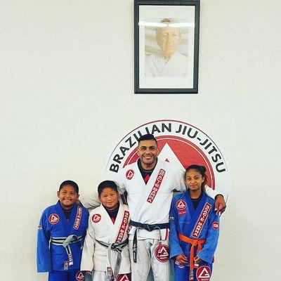 Professor Hector and my kids on the 5th Stop of their Gracie Barra Summer Tour.  Awesome Professor... great with the kids.