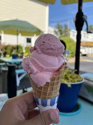 Strawberry ice cream in a waffle cone!