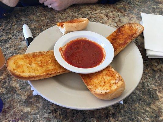 Garlic bread appetizer -- garlic and paprika and the sauce is the spaghetti meat sauce