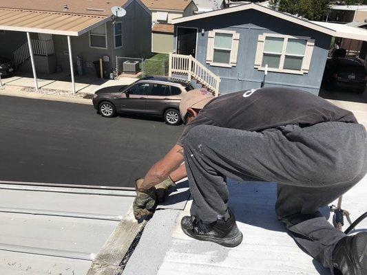 Our Professional Roofer Scott is repairing a Leak for one of our customers that complained of the gutter was not draining.