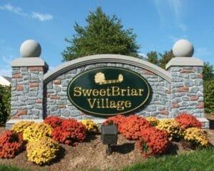 A neighborhood entrance monument featuring a custom made sign