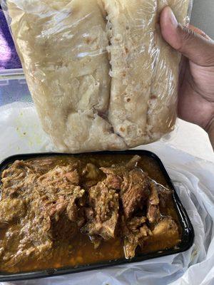 Curry goat and buss up