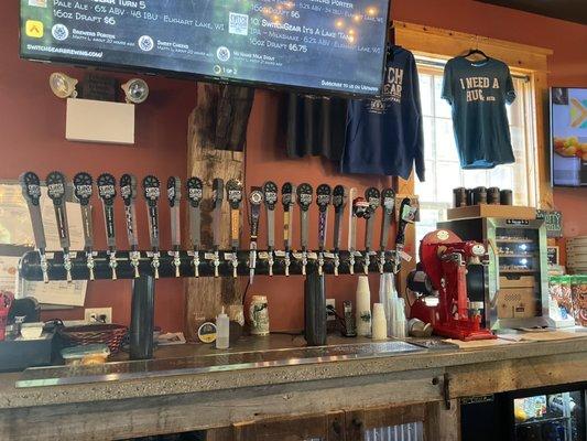 Main taps in taproom at bar.