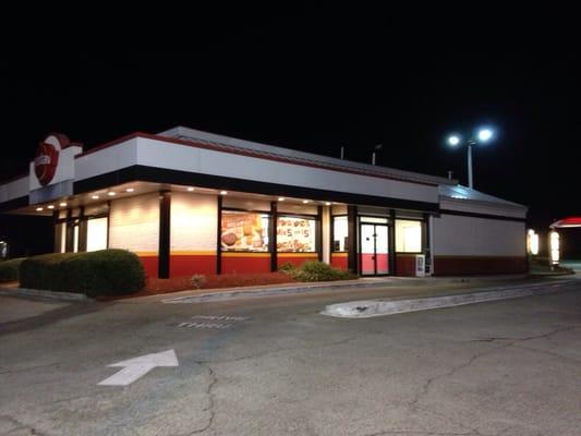 The storefront at night.