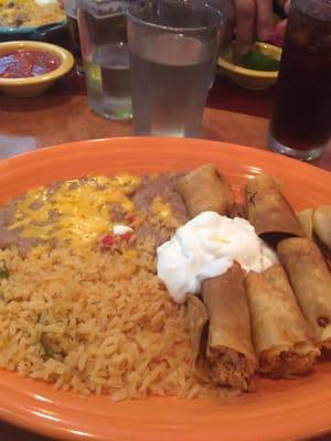 Taquitos de pollo (I opted out the onions and avocado toppings).