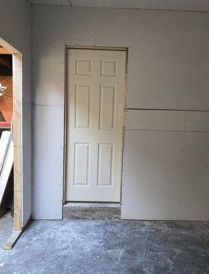 Drywall and new door installation