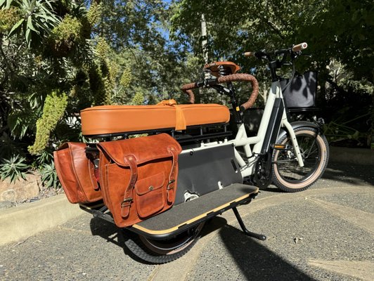 E-cargo bike with a custom Wicked Stitch saddle.