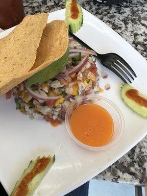 Habanero mango ceviche tostada $12