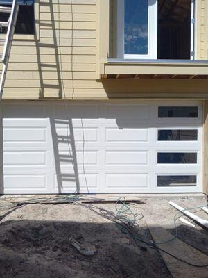 White long panel with  ranch windows in vertical