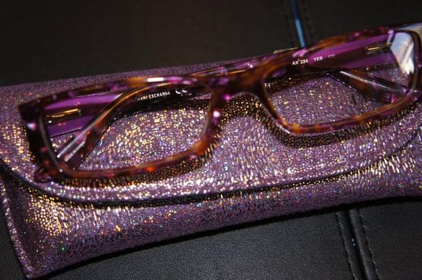 Armani has cute frames and an eyeglass case with some bling!