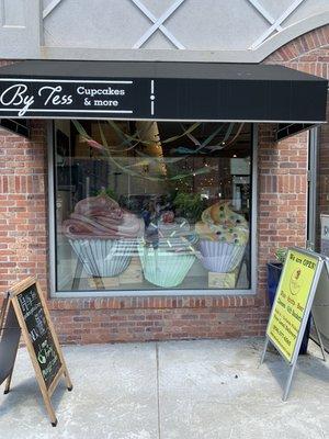 Storefront window with cupcake decorations