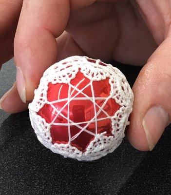 Ornaments made with bits of lace- on sale seasonally at the museum