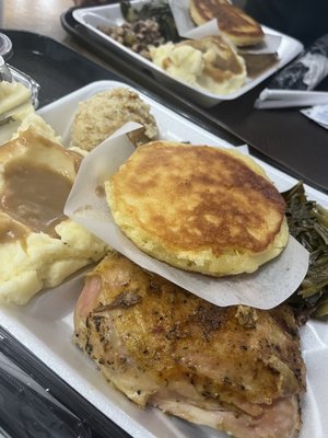 Baked chicken, mashed potatoes & gravy, collards, black eyes peas, dressing, and dried corn bread.