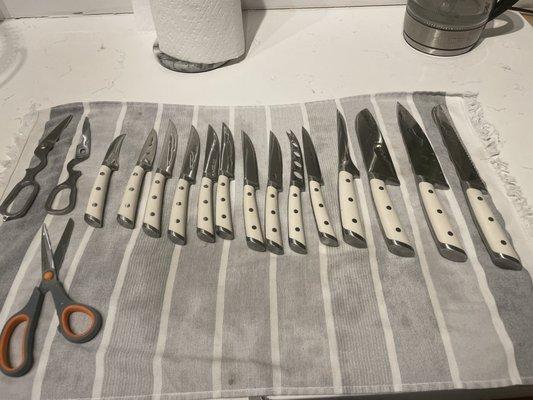 The knives, freshly sharpened and washed.