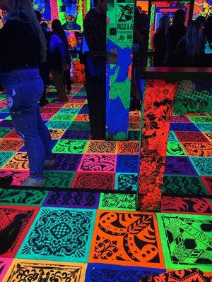 The dance floor is a neon explosion!