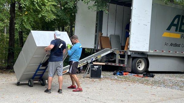 Pristine Movers unloading our U-Pack ABF trailer.