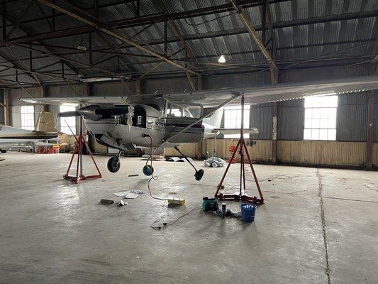 Gear inspection on a Cessna 182