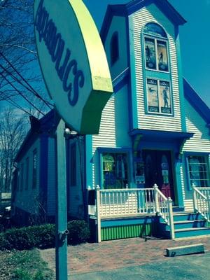 Look for the big surfboard sign in front of the old church. Lower Village, near Washington Hose Company (Fire Station).