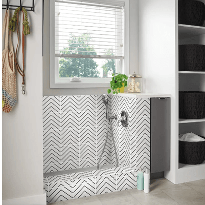 Say goodbye to muddy paws and fur-covered floors - this porcelain tile creates a fun patterned look for your furry friend's bath time.