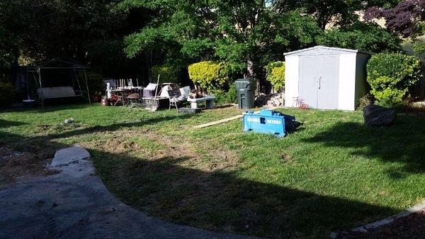 Before photo of complete backyard concrete/landscape project