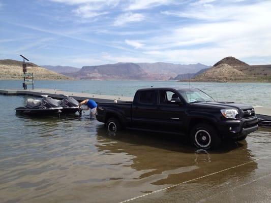 Dropping the skis in the lake!