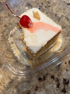 Tres leches cake tasted like an old refrigerator and there was a hair on it