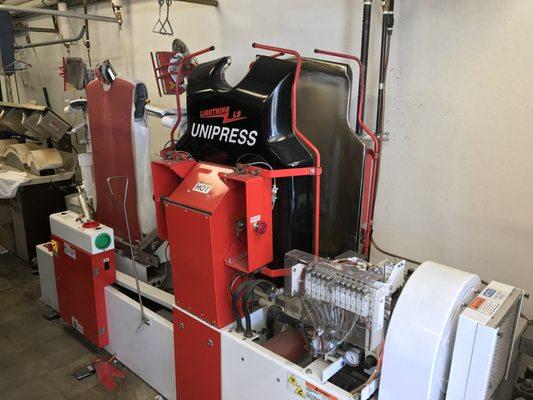 Garment Press Machine Inside of Stansbury Dry Cleaners & Laundry