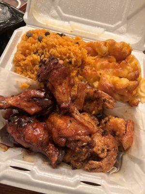 Wings and shrimp with Spanish rice and Mac and cheese