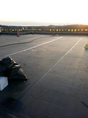 This is a epdm rubber roofing system.Its on a concrete deck, with a 2inch iso insulation boardand is fully glued down.And con...