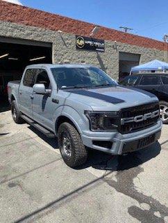 Fully Customized Ford F-150 Lariat 4x4 5.0 V8. We added a borla atak exhaust, raptor conversions to the headlights, bumper, and grille.