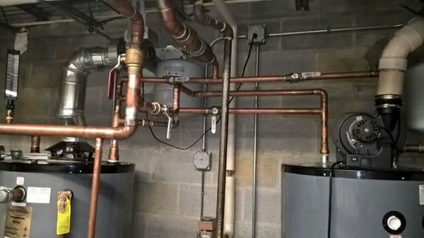 Water heaters piped in series