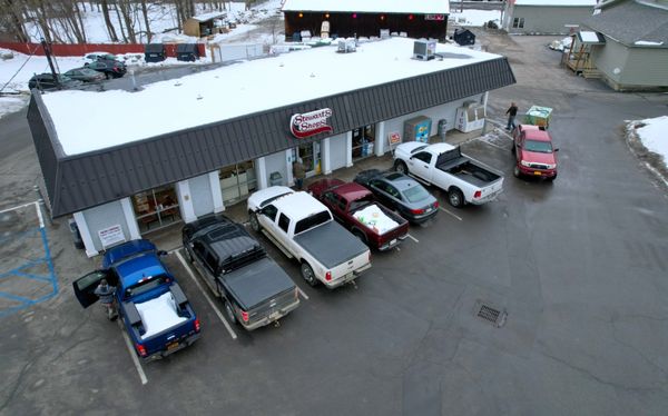 Drone shot of the entrance of the shop.