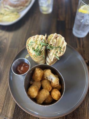 Breakfast burrito and tots