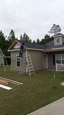 Finishing up the siding.