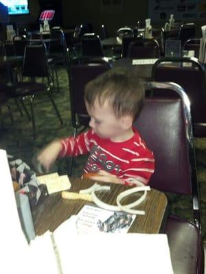 My nephew eating straight onions and ketchup @ finish line