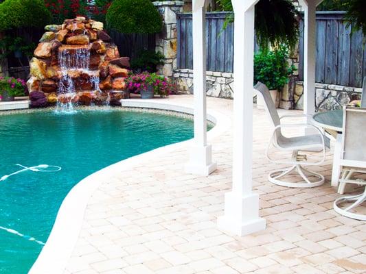 The Backyard Paradise. New water feature, new pavers, and new pool installation.