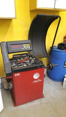 Tire balancing machine. Worked for my tire + wheel