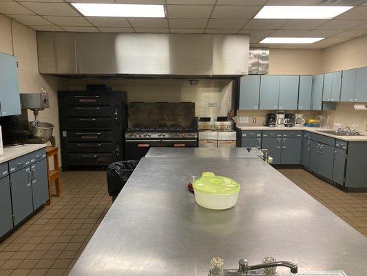 Gourmet kitchen can be rented out by caterers and bakers by the hour.